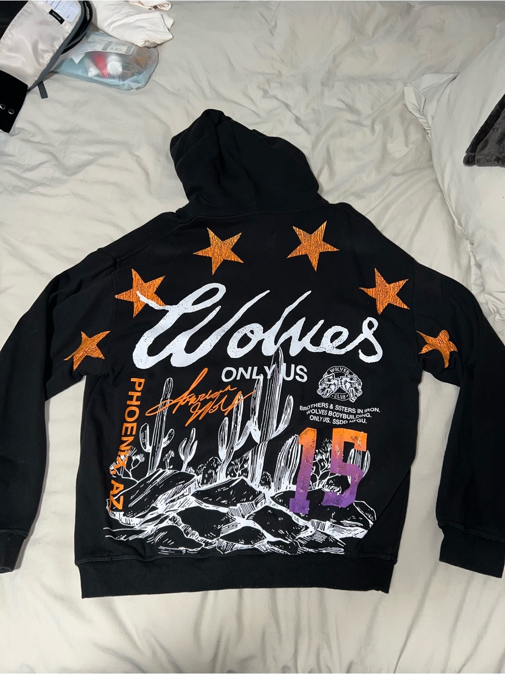 Wolves Only Us Graphic Hoodie - Black with Orange Stars